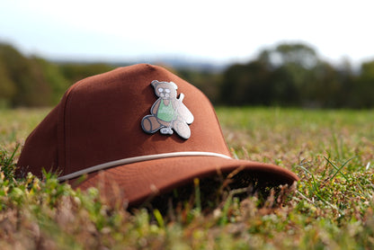 Divots Teddy Bear Branded Bills Trucker Hat (Brick w/ White Rope)